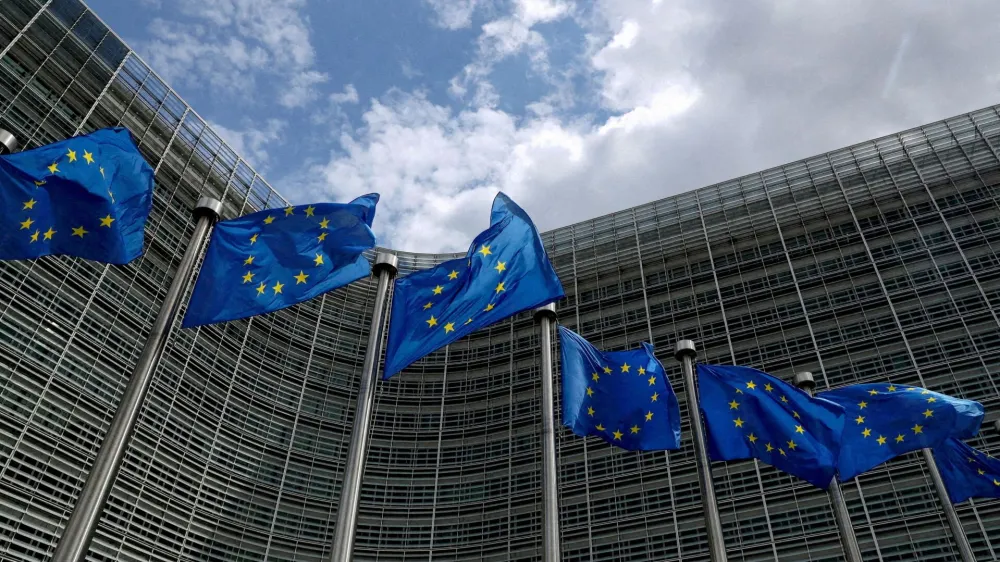 FILE PHOTO: European Union flags flutter outside the European Commission headquarters in Brussels, Belgium, June 5, 2020. REUTERS/Yves Herman/File Photo