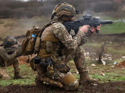 Members of Ukrainian special forces engage in zeroing their weapons prior to a mission, amid Russia?s attack on Ukraine, in the region of Bakhmut, Ukraine, April 6, 2023. REUTERS/Kai Pfaffenbach