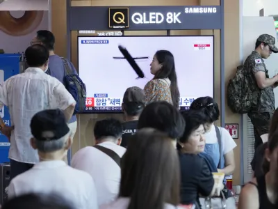 A TV screen shows a file image of North Korea's missile launch during a news program at the Seoul Railway Station in Seoul, South Korea, Saturday, July 22, 2023. North Korea fired several cruise missiles toward its western sea Saturday, South Korea's military said, marking the second launch event this week apparently in protest of the docking of a nuclear-armed U.S. submarine in South Korea. (AP Photo/Ahn Young-joon)