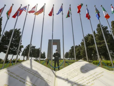 A Turkish soldier stands guard during the international service in recognition of the Gallipoli campaign at Mehmetcik monument in the Gallipoli peninsula, Turkey, Sunday, April 24, 2022. The annual Anzac Day ceremony on Monday, April 25 remembers the forces of the Australian and New Zealand Army Corps under British command in World War I who fought a bloody nine-month battle against Turkish forces on the Gallipoli peninsula in 1915. (AP Photo/Emrah Gurel)