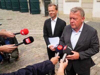 Danish Foreign Minister Lars Lokke Rasmussen and Justice Minister Peter Hummelgaard speak to journalists outside the foreign ministry in Copenhagen, Denmark, July 31, 2023. REUTERS/Tom Little