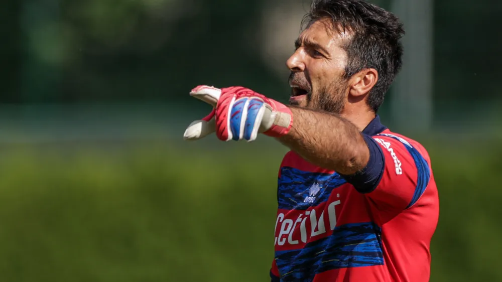 FILED - 21 July 2021, Italy, Brixen: Parma's goalkeeper Gianluigi Buffon gives instructions to his team-mates during the pre-season friendly soccer match between VfL Bochum and FC Parma. The long-time Italian world-class goalkeeper Gianluigi Buffon is about to end his career, according to several media reports. Photo: Tim Rehbein/dpa