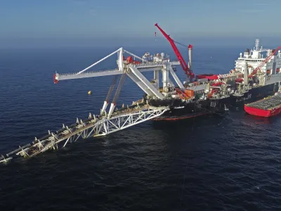 FILE - A ship works offshore in the Baltic Sea on the natural gas pipeline Nord Stream 2 from Russia to Germany, on Nov. 11, 2018. Denmark's maritime authority said Monday Sept. 26, 2022 that a gas leak had been observed in a pipeline leading from Russia to Europe underneath the Baltic Sea that is dangerous to shipping traffic. (Bernd Wuestneck/dpa via AP, File)