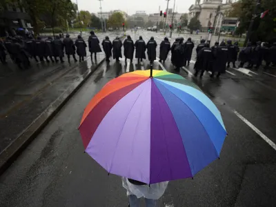 Serbian riot policemen line up to prevent anti-gay protesters from clashing with participants in the European LGBTQ pride march march in Belgrade, Serbia, Saturday, Sept. 17, 2022. Amid mounting tensions, police were deployed Saturday in downtown Belgrade where a Pride march was expected to be held despite threats from anti-gay groups and an official earlier ban. (AP Photo/Darko Vojinovic)