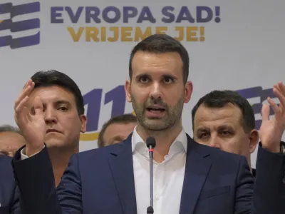 Milojko Spajic, president of the centrist Europe Now party speaks at his headquarters after parliamentary election in Montenegro's capital Podgorica, Sunday, June 11, 2023. A recently formed centrist group that advocates Montenegro joining the European Union was projected to win the small Balkan country's early parliamentary election Sunday, but without enough support to form a government on its own, according to independent vote monitors. (AP Photo/Risto Bozovic)