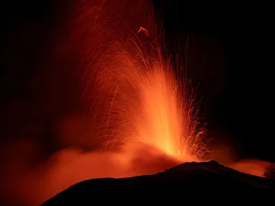 Mount Etna, Europe's most active volcano, lights up the night sky with eruptions as seen from Rocca Della Valle, Italy, August 13, 2023. Etna Walk/Marco Restivo/ Handout via REUTERS ATTENTION EDITORS - THIS IMAGE HAS BEEN SUPPLIED BY A THIRD PARTY.   TPX IMAGES OF THE DAY