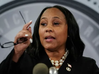 FILE PHOTO: Fulton County District Attorney Fani Willis speaks to the media after a Grand Jury brought back indictments against former president Donald Trump and 18 of his allies in their attempt to overturn the state's 2020 election results, in Atlanta, Georgia, U.S. August 14, 2023. REUTERS/Elijah Nouvelage./File Photo