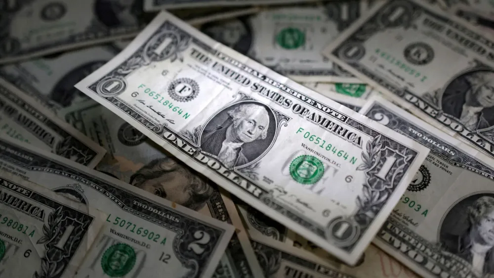 FILE PHOTO: U.S. dollar banknotes are seen in this illustration taken March 10, 2023. REUTERS/Dado Ruvic/Illustration/File Photo