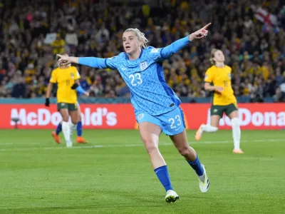 England's Alessia Russo celebrates after scoring her side's third goal during the Women's World Cup semifinal soccer match between Australia and England at Stadium Australia in Sydney, Australia, Wednesday, Aug. 16, 2023. (AP Photo/Abbie Parr)