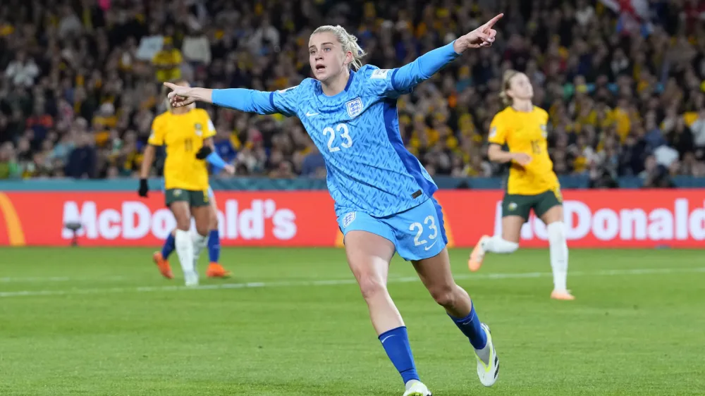 England's Alessia Russo celebrates after scoring her side's third goal during the Women's World Cup semifinal soccer match between Australia and England at Stadium Australia in Sydney, Australia, Wednesday, Aug. 16, 2023. (AP Photo/Abbie Parr)