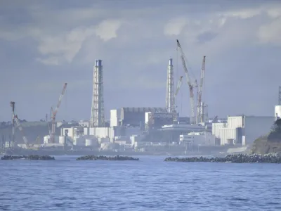 Fukushima Daiichi nuclear plant is seen from Namie, Fukushima prefecture, Japan Tuesday, Aug. 22, 2023. Japan will start releasing treated and diluted radioactive wastewater from the Fukushima Daiichi nuclear plant into the Pacific Ocean as early as Thursday, a controversial but essential early step in the decades of work to shut down the facility 12 years after its meltdown disaster. (Kyodo News via AP)