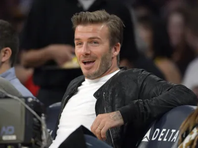 Soccer player David Beckham watches the Los Angeles Lakers play the Orlando Magic NBA basketball game, Sunday, Dec. 2, 2012, in Los Angeles. The Magic won 113-103. (AP Photo/Mark J. Terrill) 