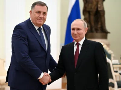 Bosnian Serb leader Milorad Dodik, left, and Russian President Vladimir Putin pose for a photo during their meeting at the Kremlin in Moscow, Russia. in Moscow, Russia, Tuesday, May 23, 2023. (Alexey Filippov, Sputnik, Kremlin Pool Photo via AP)