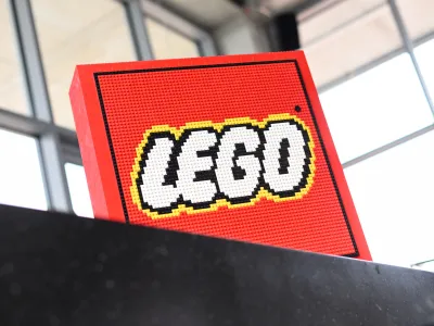 FILED - 25 May 2022, Bavaria, Munich: A general view of the Lego company logo built from bricks at the Lego Summer Birthday Bash anniversary event. Danish toymaker Lego has reported high profits for the first half of 2023, following on from a record year in 2022. Photo: Tobias Hase/dpa