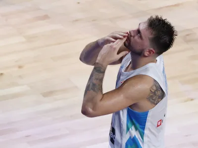 Basketball - FIBA World Cup 2023 - First Round - Group F - Slovenia v Cape Verde - Okinawa Arena, Okinawa, Japan - August 30, 2023 Slovenia's Luka Doncic reacts REUTERS/Issei Kato