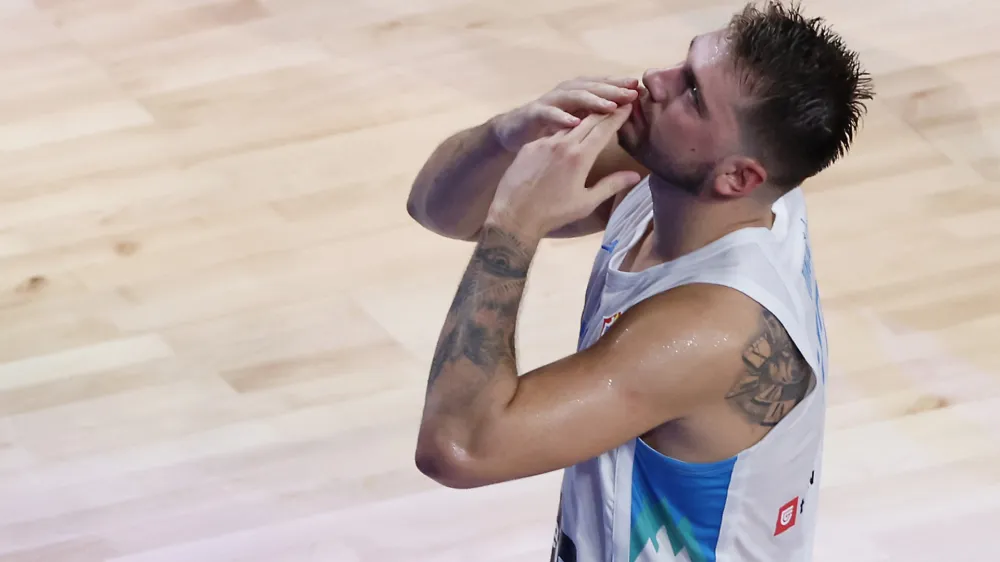 Basketball - FIBA World Cup 2023 - First Round - Group F - Slovenia v Cape Verde - Okinawa Arena, Okinawa, Japan - August 30, 2023 Slovenia's Luka Doncic reacts REUTERS/Issei Kato