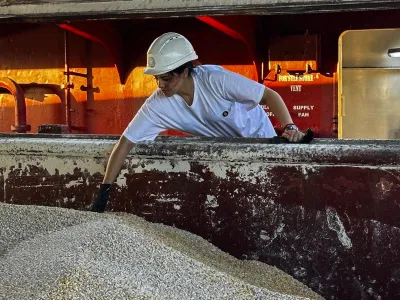 In this photo released by the United Nations, a U.N. official of the Joint Coordination Centre carries out an inspection on board of the bulk cargo ship TQ Samsun, which traveled from Odessa, Ukraine, loaded with grain, while anchored in the Black Sea, near the entrance of the Bosphorus Strait in Istanbul, Turkey, Monday, July 17, 2023. Russia on Monday halted a breakthrough wartime deal that allowed grain to flow from Ukraine to countries in Africa, the Middle East and Asia where hunger is a growing threat and high food prices have pushed more people into poverty. (United Nations via AP)