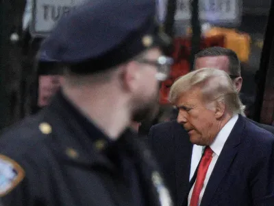 Former U.S. President Donald Trump arrives at Trump Tower, after his indictment by a Manhattan grand jury following a probe into hush money paid to porn star Stormy Daniels, in New York City, U.S April 3, 2023. REUTERS/Jeenah Moon