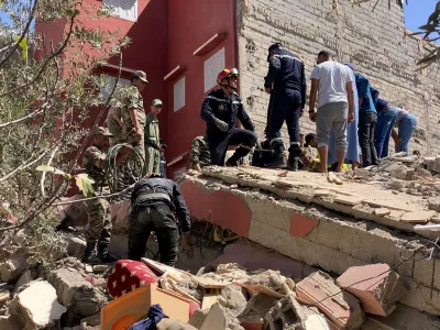 Rescuers carry a search operation following a powerful earthquake, in Amizmiz, in Morocco, September 9, 2023. REUTERS/Abdelhak Balhaki