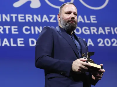 The 80th Venice Film Festival - Awards Ceremony - Venice, Italy, September 9, 2023. Director Yorgos Lanthimos poses with Golden Lion Award for Best Film for the movie 'Poor Things'. REUTERS/Guglielmo Mangiapane