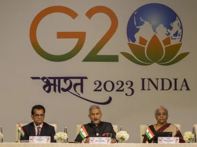 India's Finance Minister Nirmala Sitharaman, right, and G20 summit sherpa Amitabh Kant, left, listen to India's Foreign Minister S. Jaishankar, center, during a press conference at the international media centre on the sidelines of the G20 summit in New Delhi, India, Saturday, Sept. 9, 2023. (AP Photo/Dar Yasin)