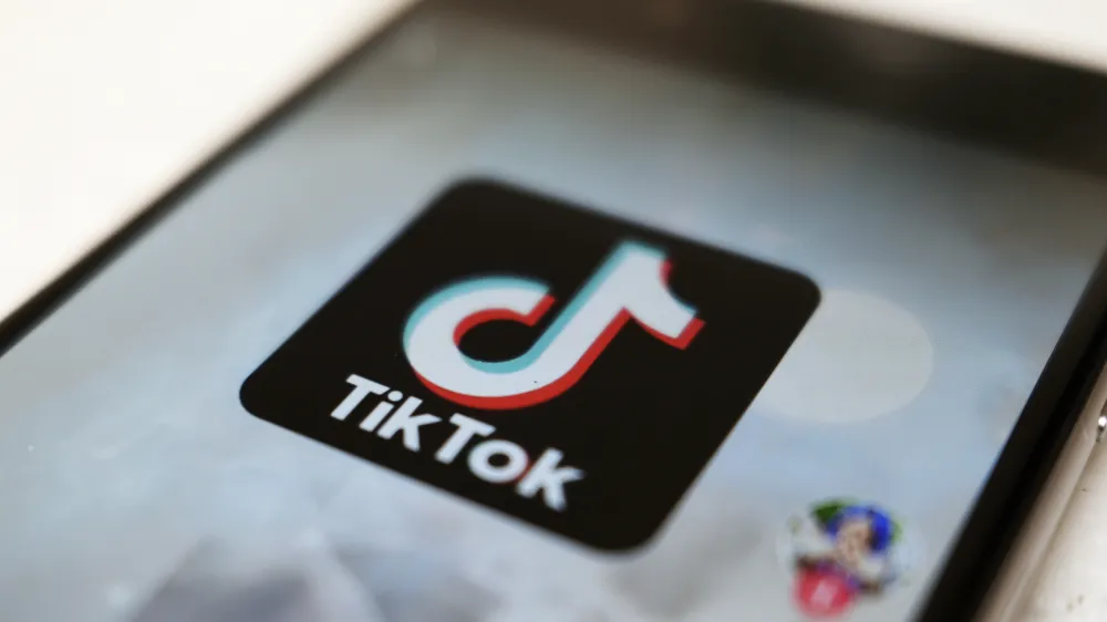 FILE - This Sept. 28, 2020, file photo, shows a TikTok logo on a smartphone screen in Tokyo. After months of testing, TikTok is fully launching its e-commerce product in the U.S., in an effort to translate the app's cultural relevance among young consumers to sales. The company said Tuesday, Sept. 12, 2023 its shopping wing, called TikTok Shop, will include several features such as a "Shop Tab," a marketplace its been testing on the app since August. (AP Photo/Kiichiro Sato, File)