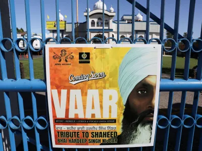 A sign outside the Guru Nanak Sikh Gurdwara temple is seen after the killing on its grounds in June 2023 of Sikh leader Hardeep Singh Nijjar, in Surrey, British Columbia, Canada September 18, 2023. REUTERS/Chris Helgren   TPX IMAGES OF THE DAY