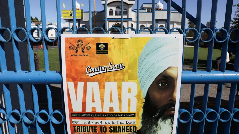 A sign outside the Guru Nanak Sikh Gurdwara temple is seen after the killing on its grounds in June 2023 of Sikh leader Hardeep Singh Nijjar, in Surrey, British Columbia, Canada September 18, 2023. REUTERS/Chris Helgren   TPX IMAGES OF THE DAY