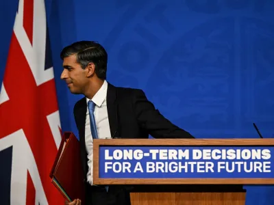 Britain's Prime Minister Rishi Sunak leaves the stage after delivers a speech during a press conference on the net zero target, at the Downing Street Briefing Room, in central London, on September 20, 2023. The UK looked set to backtrack on policies aimed at achieving net zero emissions by 2050 with Prime Minister Rishi Sunak expected to water down some of the government's green commitments. The move comes amid growing concern over the potential financial cost of the government's policies to achieve net zero carbon emissions by mid-century.   JUSTIN TALLIS/Pool via REUTERS