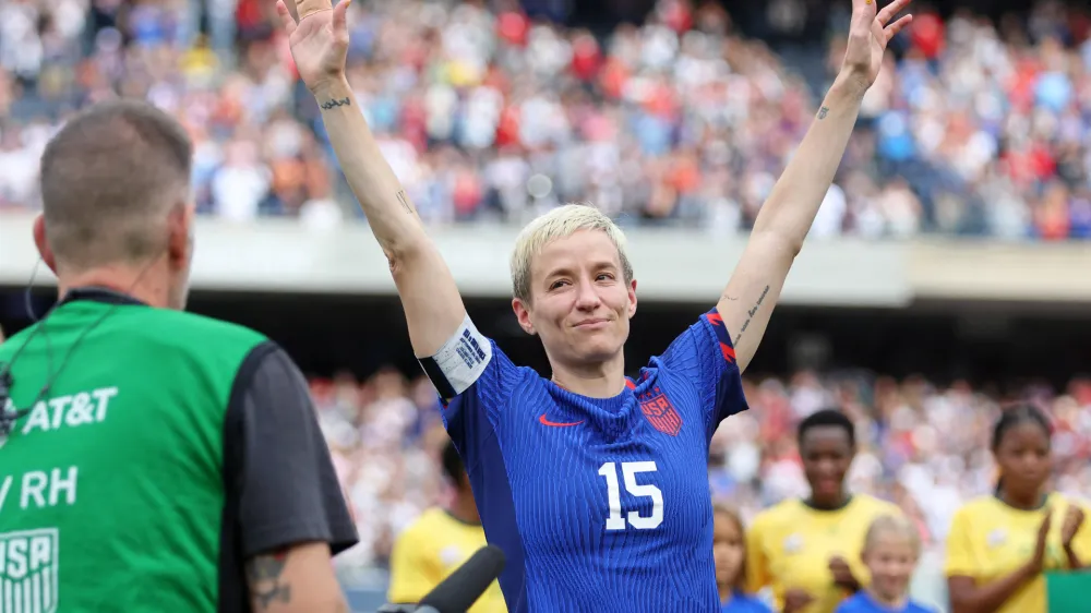 Sep 24, 2023; Chicago, Illinois, USA; United States forward Megan Rapinoe (15) reacts after a ceremony honoring her career on the national team before the game against South Africa at Soldier Field. Mandatory Credit: Jon Durr-USA TODAY Sports