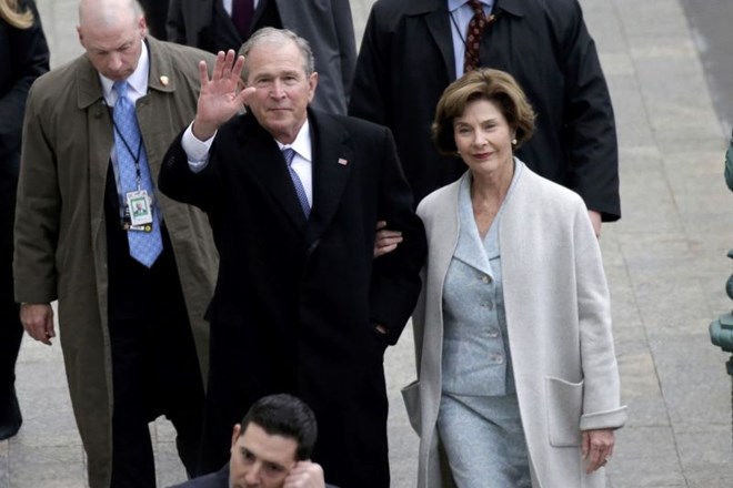 Nekdanji predsednik George W. Bush s soprogo (Foto: Reuters)