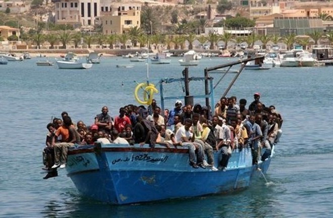 Begunci v Lampedusi.