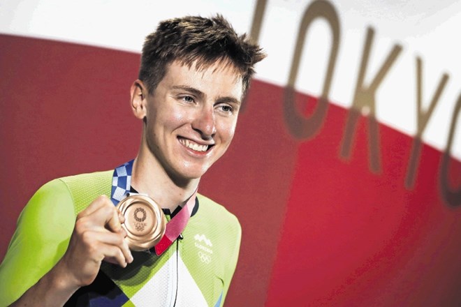 Tadej Pogačar se je olimpijske bronaste kolajne na cestni dirki izredno razveselil.