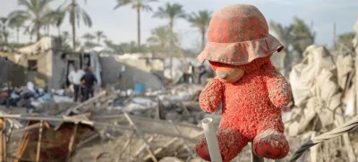 FILED - 05 December 2024, Palestinian Territories, Khan Yunis: A toy is seen among destroyed tents following an Israeli attack targeted an Internally displaced person (IDP) camp in the Mawasi Khan Younis area, southern Gaza Strip last night. Photo: Mohammed Skaik/News Images via ZUMA Press Wire/dpa