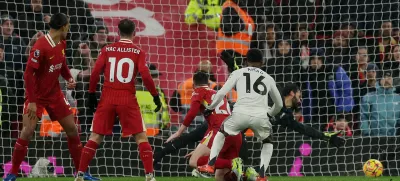 Soccer Football - Premier League - Liverpool v Manchester United - Anfield, Liverpool, Britain - January 5, 2025 Manchester United's Amad Diallo scores their second goal past Liverpool's Alisson Becker REUTERS/Phil Noble EDITORIAL USE ONLY. NO USE WITH UNAUTHORIZED AUDIO, VIDEO, DATA, FIXTURE LISTS, CLUB/LEAGUE LOGOS OR 'LIVE' SERVICES. ONLINE IN-MATCH USE LIMITED TO 120 IMAGES, NO VIDEO EMULATION. NO USE IN BETTING, GAMES OR SINGLE CLUB/LEAGUE/PLAYER PUBLICATIONS. PLEASE CONTACT YOUR ACCOUNT REPRESENTATIVE FOR FURTHER DETAILS..