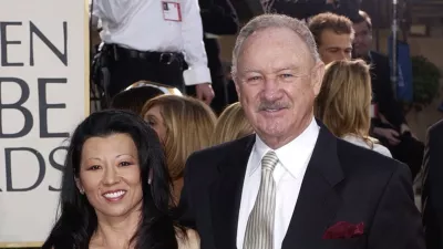 FILE - Actor Gene Hackman arrives with his wife, Betsy Arakawa, for the 60th Annual Golden Globe Awards in Beverly Hills, Calif., Sunday, Jan. 19, 2003. (AP Photo/Mark J. Terrill, File)