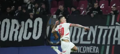 Leipzig's Benjamin Sesko celebrates after he scored during the UEFA Champions League opening phase soccer match between Leipzig and Juventus in Leipzig, Germany, Wednesday, Oct. 2, 2024.(AP Photo/Ebrahim Noroozi)