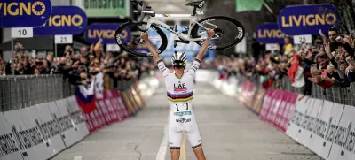 Reigning World Champion Slovenia's Tadej Pogacar celebrates winning Il Lombardia, Tour of Lombardy cycling race, in Como, Italy, Saturday, Oct. 12, 2024. (Marco Alpozzi/LaPresse via AP)