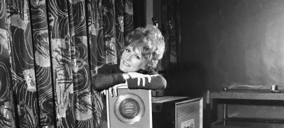 1st March 1965: English singer Petula Clark with a gold disc for her song 'Downtown'. (Photo by R. McPhedran/Express/Getty Images)