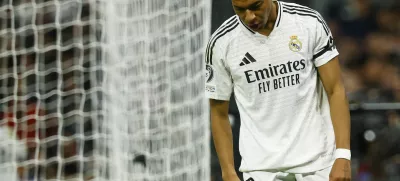 Soccer Football - Champions League - Real Madrid v AC Milan - Santiago Bernabeu, Madrid, Spain - November 5, 2024 Real Madrid's Kylian Mbappe reacts REUTERS/Susana Vera