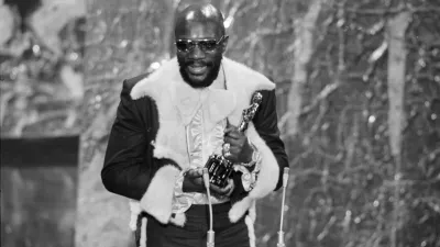 ** FILE ** In this April 11, 1972 picture, Isaac Hayes holds his Oscar for best song "Theme From Shaft" from the movie "Shaft" during the Academy Awards ceremonies in the Dorothy Chandler Pavilion. Hayes, the pioneering singer, songwriter and musician, died in Memphis, Tenn. on Sunday, Aug. 10, 2008, the Shelby County Sheriff's Office said. He was 65. (AP Photo)