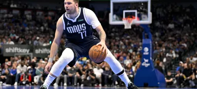 Nov 19, 2024; Dallas, Texas, USA; Dallas Mavericks guard Luka Doncic (77) brings the ball up court against the New Orleans Pelicans during the second half at the American Airlines Center. Mandatory Credit: Jerome Miron-Imagn Images