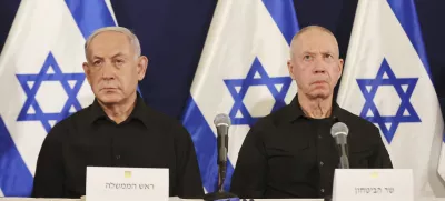 FILE - Israeli Prime Minister Benjamin Netanyahu, left, and Defense Minister Yoav Gallant attend a press conference in the Kirya military base in Tel Aviv, Israel, Saturday, Oct. 28, 2023. (Abir Sultan/Pool Photo via AP, File)