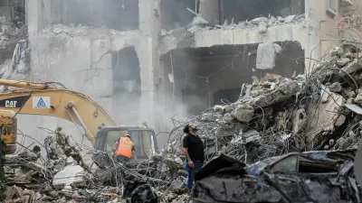 Civil defense members and rescuers work at the site of an Israeli strike in Beirut's Basta neighbourhood, amid the ongoing hostilities between Hezbollah and Israeli forces, Lebanon November 23, 2024. REUTERS/Thaier Al-Sudani   TPX IMAGES OF THE DAY