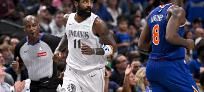 Nov 27, 2024; Dallas, Texas, USA; Dallas Mavericks guard Kyrie Irving (11) runs back up the court after scoring against the New York Knicks during the second half at the American Airlines Center. Mandatory Credit: Jerome Miron-Imagn Images